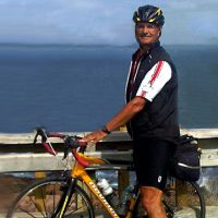 Terry Manning poses for a picture during his cross N. America bike tour