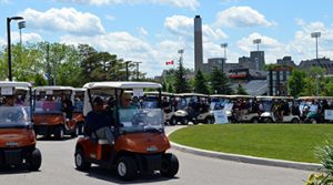 Golfers heading out in their carts at 2016 FOH