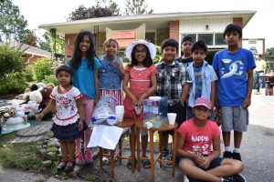 children selling lemonade