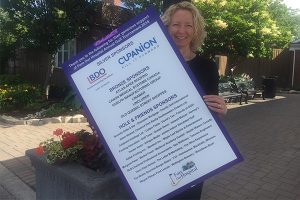 Suzanne Bone with FOH 2018 Sponsor Sign