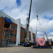 Gif of crane lifting new MRI into its suite at Guelph General Hospital