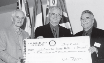 Bob Ireland with Rotary colleagues, Colin Ferguson and Bill Winegard, presenting the Rotary Club of Guelph donation to the Partners for Better Health Campaign.