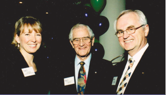 Suzanne Bone, Bill Winegard, Bob Ireland at the Partners for Better Health over the goal celebration.