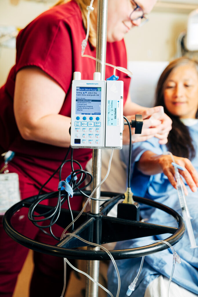 Nurse and patient and IV Pump